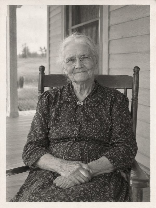 Before: a 1940s black-and-white portrait of a grandmother in a rocking chair